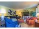 Cozy living room with comfortable seating, a TV, and bright, neutral walls at 4200 Marvin Pl, Raleigh, NC 27609