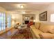 Comfortable living room featuring a brick fireplace and access to the outdoors at 4200 Marvin Pl, Raleigh, NC 27609