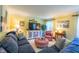 Cozy living room with comfortable seating, a TV, and bright, neutral walls at 4200 Marvin Pl, Raleigh, NC 27609