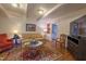 Cozy living room with hardwood floors, area rug, and natural light at 4200 Marvin Pl, Raleigh, NC 27609