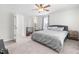 A cozy bedroom features neutral decor, a comfortable bed, and an adjacent Bedroom space at 445 Sturgeon St, Smithfield, NC 27577