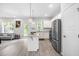Bright and airy kitchen featuring stainless steel appliances, a center island, and an open layout at 445 Sturgeon St, Smithfield, NC 27577