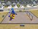 Aerial view of community playground with colorful slides, swings, and surrounding neighborhood homes at 445 Sturgeon St, Smithfield, NC 27577
