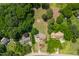 Extensive and well-maintained green space surrounding homes in a private, wooded area at 4720 Cedarfield Dr, Raleigh, NC 27606