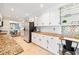 Spacious kitchen featuring granite counters, stainless steel appliances, and ample cabinet space at 4720 Cedarfield Dr, Raleigh, NC 27606