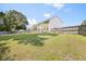 Home's extensive backyard with a privacy fence, offering a spacious outdoor retreat and potential for landscaping at 4805 Castle Crest Ct, Raleigh, NC 27616