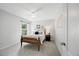 Comfortable bedroom with a ceiling fan, neutral walls, and carpet flooring at 4805 Castle Crest Ct, Raleigh, NC 27616