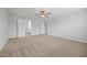 Bright and airy bedroom with multiple closets, ceiling fan and neutral tones at 525 Marion Hills Way, Knightdale, NC 27545