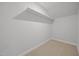 Small closet with a shelf and carpet at 525 Marion Hills Way, Knightdale, NC 27545