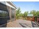 View of wooden deck with screens, showing access to the backyard at 525 Marion Hills Way, Knightdale, NC 27545