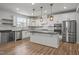 Well-designed kitchen featuring stainless steel appliances and granite countertops at 525 Marion Hills Way, Knightdale, NC 27545