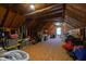 Unfinished attic with exposed wooden beams at 5413 Lower Creek Ct, Apex, NC 27539