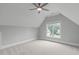Bedroom featuring neutral walls, carpet flooring, and natural light from a window at 6004 Brass Tack Ct, Fuquay Varina, NC 27526