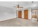 Large carpeted bedroom features doors and closet space at 6221 Winter Spring Dr, Wake Forest, NC 27587