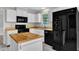 Efficient kitchen layout featuring modern appliances and ample counter space at 6221 Winter Spring Dr, Wake Forest, NC 27587