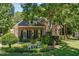 Well-maintained home with an attached garage and meticulously landscaped yard at 65 Georgetown Woods Dr, Youngsville, NC 27596