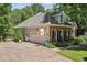 Attached garage and meticulously landscaped yard at 65 Georgetown Woods Dr, Youngsville, NC 27596