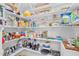 Spacious walk-in pantry with open shelving to keep your items organized at 65 Georgetown Woods Dr, Youngsville, NC 27596