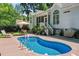 Backyard swimming pool with a patio area with seating offering a refreshing escape at 65 Georgetown Woods Dr, Youngsville, NC 27596