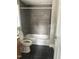 Modern bathroom featuring tiled shower and bathtub, stylish vanity, and sleek flooring at 713 Champion St, Henderson, NC 27536