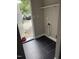 Mud/laundry room featuring tile flooring and entrance at 713 Champion St, Henderson, NC 27536