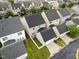 Aerial view of backyard and garage of homes in community at 732 Keystone Park Dr, Morrisville, NC 27560
