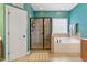 Bathroom features a full shower, separate soaking tub, and a neutral color scheme at 732 Keystone Park Dr, Morrisville, NC 27560