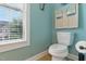 Bright bathroom with a window view and decorative towels at 732 Keystone Park Dr, Morrisville, NC 27560