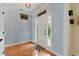 Inviting entryway with hardwood floors, decorative accents, and plenty of natural light at 732 Keystone Park Dr, Morrisville, NC 27560