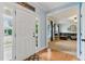 Bright entryway leading to a cozy living room with hardwood floors and ample natural light at 732 Keystone Park Dr, Morrisville, NC 27560
