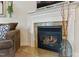 Cozy living room with a granite fireplace and hearth, perfect for relaxing evenings at 732 Keystone Park Dr, Morrisville, NC 27560