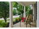 Charming front porch with comfortable seating overlooking a peaceful street at 732 Keystone Park Dr, Morrisville, NC 27560