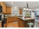 Charming kitchen boasting modern appliances, a center island, and plenty of cabinet storage at 732 Keystone Park Dr, Morrisville, NC 27560
