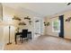 Inviting living room featuring decorative shelves and a large window, offering abundant natural light at 732 Keystone Park Dr, Morrisville, NC 27560