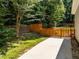 Spacious back yard featuring a concrete patio and wooden fence providing a private outdoor space at 7605 Pats Branch Dr, Raleigh, NC 27612