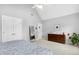 Bedroom features an accent wall, neutral colored carpet, and large closets at 800 Highgrove Dr, Chapel Hill, NC 27516