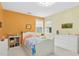 Bedroom with colorful walls, natural light, and neutral colored carpet at 800 Highgrove Dr, Chapel Hill, NC 27516