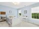 Bedroom featuring blue walls, natural light, and neutral colored carpet at 800 Highgrove Dr, Chapel Hill, NC 27516