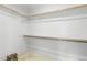 Walk-in closet with ample storage space and neutral colored carpet at 800 Highgrove Dr, Chapel Hill, NC 27516