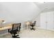 Upstairs office space with dual work areas, neutral paint, and carpeted floors at 800 Highgrove Dr, Chapel Hill, NC 27516