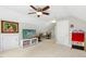 Spacious playroom featuring mounted TV, storage, and adjacent study area at 800 Highgrove Dr, Chapel Hill, NC 27516