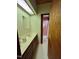 Bathroom with marbled countertop, mirror, and doorway to toilet and shower at 808 Indian Springs Rd, Chapel Hill, NC 27514