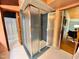 Bathroom featuring a shower with glass doors, and hexagonal tile floors at 808 Indian Springs Rd, Chapel Hill, NC 27514