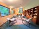 Office space features natural light, built in shelving, and comfortable seating at 808 Indian Springs Rd, Chapel Hill, NC 27514