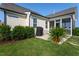 Backyard featuring a patio, grill, manicured lawn, and established landscaping at 857 Mill Station Ln, Wendell, NC 27591