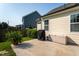 Private backyard patio with an outdoor grill and storage, perfect for entertaining guests at 857 Mill Station Ln, Wendell, NC 27591