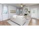 Cozy living room with a fireplace, neutral decor, and plenty of natural light at 857 Mill Station Ln, Wendell, NC 27591