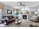 Comfortable living room featuring a fireplace and stylish furniture at 908 Town Side Dr, Apex, NC 27502
