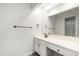Bright bathroom features a spacious vanity, updated fixtures, and a large mirror reflecting the shower with curtain at 911 Washington St # 304, Raleigh, NC 27605