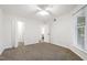 Spacious bedroom features ceiling fan and carpeted floors at 911 Washington St # 304, Raleigh, NC 27605